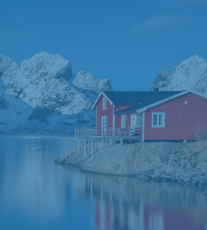 Red house on a quaint Norwegian lake